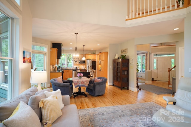 25 Madelyn Ln, Fairview, NC 28730 - living area with light wood-style flooring, a chandelier, and recessed lighting