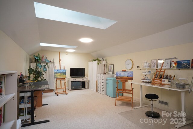 25 Madelyn Ln, Fairview, NC 28730 - living room with a skylight, vaulted ceiling, and carpet