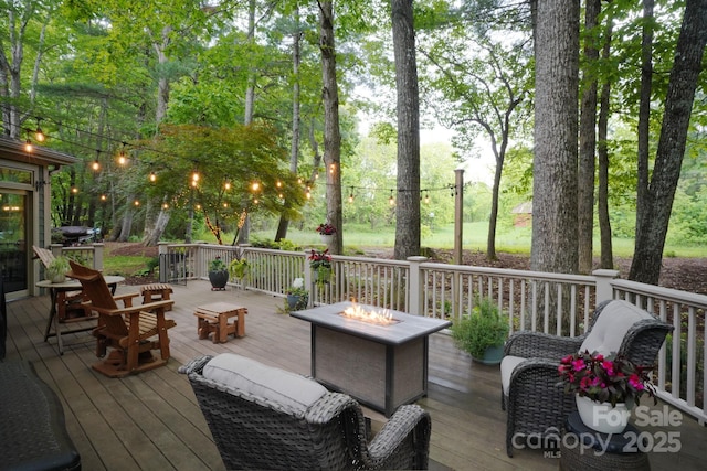 25 Madelyn Ln, Fairview, NC 28730 - deck with a fire pit