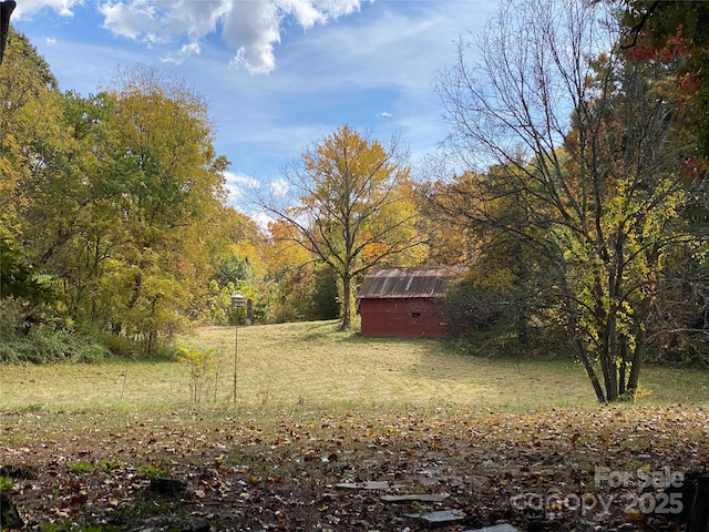 25 Madelyn Ln, Fairview, NC 28730 - view of green lawn with a wooded view