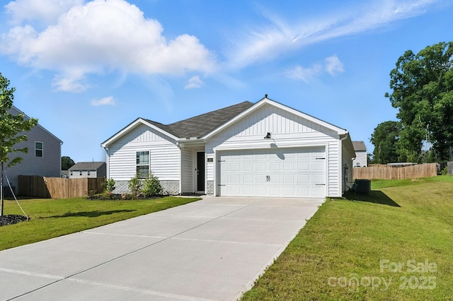 130 St James Way, Sanford, NC 27332 - ranch-style home with board and batten siding, driveway, and an attached garage