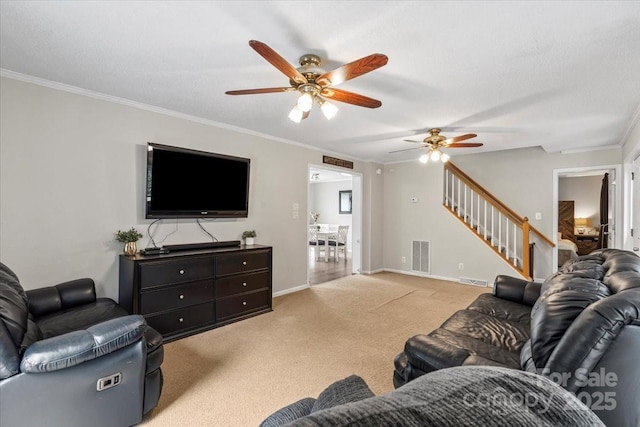 1764 Tomlinson Loop, Connelly Springs, NC 28612 - living area with stairway, ceiling fan, light colored carpet, and crown molding