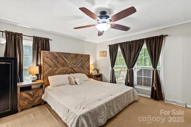 1764 Tomlinson Loop, Connelly Springs, NC 28612 - bedroom with light carpet, a ceiling fan, and ornamental molding