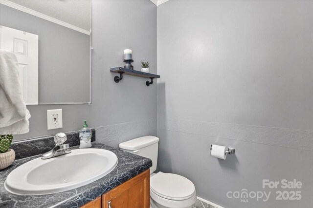 1764 Tomlinson Loop, Connelly Springs, NC 28612 - half bathroom with vanity and crown molding