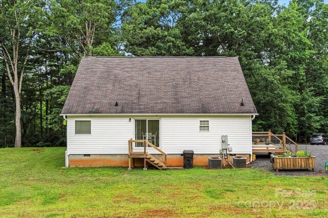 1764 Tomlinson Loop, Connelly Springs, NC 28612 - rear view of property with a yard, a shingled roof, entry steps, a wooden deck, and crawl space