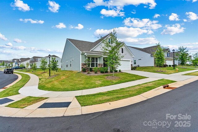 5846 Oak Branch Cir, Maiden, NC 28650 - traditional-style home with driveway, a residential view, a front lawn, stone siding, and roof with shingles