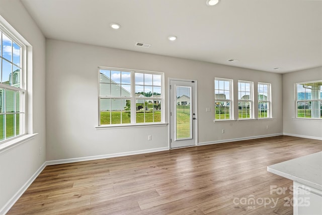 5846 Oak Branch Cir, Maiden, NC 28650 - unfurnished living room with light wood finished floors and recessed lighting