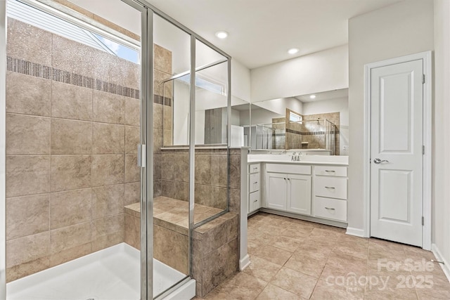 5846 Oak Branch Cir, Maiden, NC 28650 - bathroom featuring a shower stall, vanity, tile patterned flooring, and recessed lighting