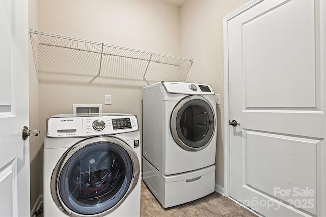 5846 Oak Branch Cir, Maiden, NC 28650 - laundry area with washing machine and dryer and light tile patterned floors