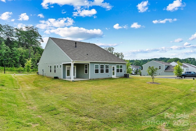 5846 Oak Branch Cir, Maiden, NC 28650 - rear view of property featuring a patio area, a lawn, and a shingled roof