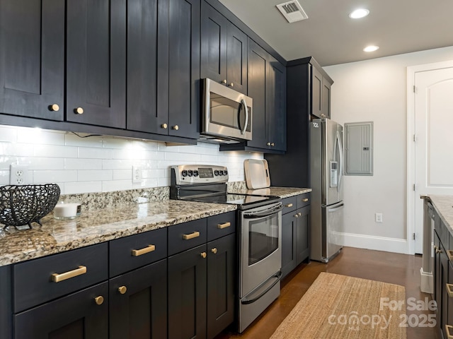 2338 Yadkin Ave Unit 505, Charlotte, NC 28205 - kitchen featuring stainless steel appliances, electric panel, tasteful backsplash, recessed lighting, and light stone counters