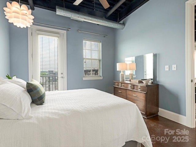 2338 Yadkin Ave Unit 505, Charlotte, NC 28205 - bedroom featuring baseboards and access to exterior