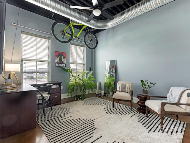 2338 Yadkin Ave Unit 505, Charlotte, NC 28205 - living area featuring an office area, a ceiling fan, and concrete floors