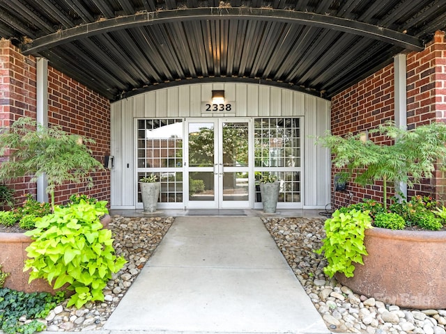 2338 Yadkin Ave Unit 505, Charlotte, NC 28205 - entrance to property featuring brick siding, french doors, and board and batten siding