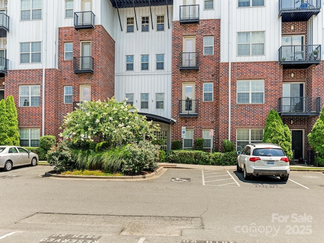 2338 Yadkin Ave Unit 505, Charlotte, NC 28205 - view of property featuring uncovered parking