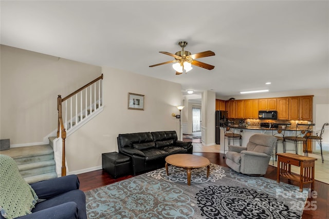 1993 W Foxwood Ct, Indian Land, SC 29707 - living area featuring wood finished floors, stairs, ceiling fan, and recessed lighting