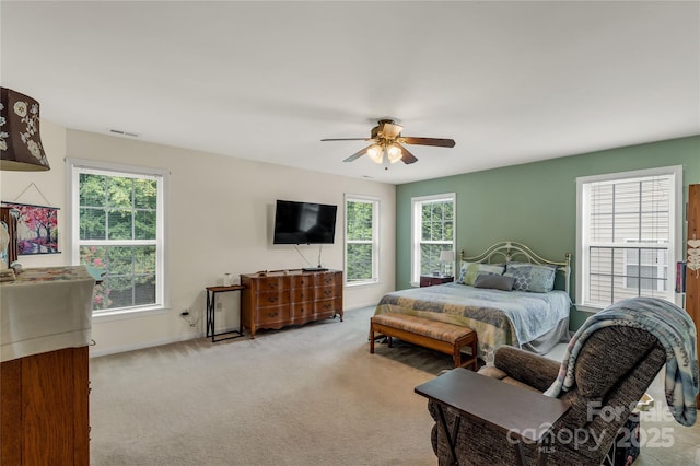 1993 W Foxwood Ct, Indian Land, SC 29707 - carpeted bedroom with multiple windows and a ceiling fan