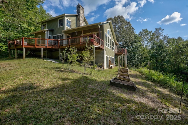 425 Sawmill Creek Rd, Bryson City, NC 28713 - rear view of property featuring a yard, a deck, and a chimney