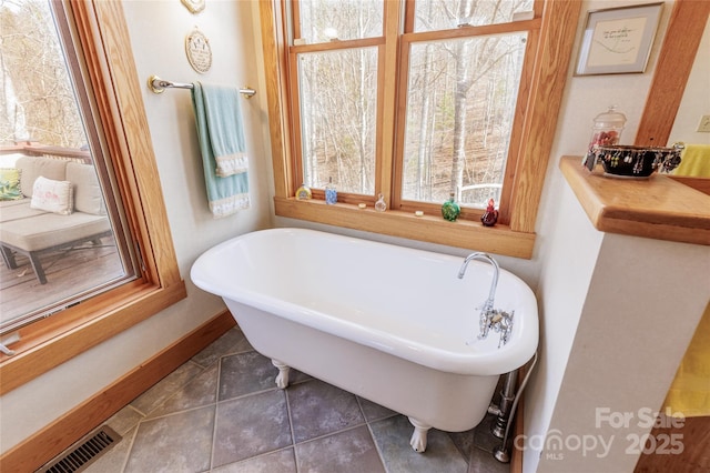 425 Sawmill Creek Rd, Bryson City, NC 28713 - bathroom with a freestanding bath and tile patterned floors