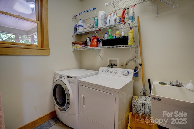 425 Sawmill Creek Rd, Bryson City, NC 28713 - laundry room with independent washer and dryer and baseboards