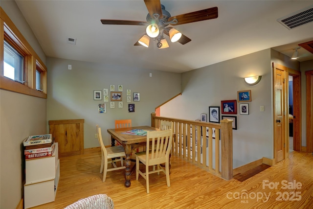 425 Sawmill Creek Rd, Bryson City, NC 28713 - dining room featuring light wood-style flooring and ceiling fan