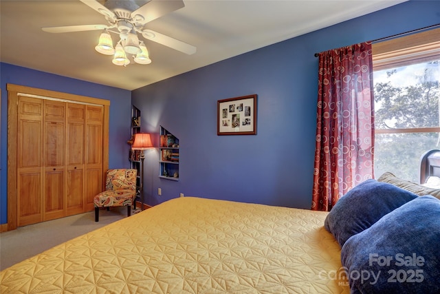425 Sawmill Creek Rd, Bryson City, NC 28713 - carpeted bedroom featuring a ceiling fan and a closet