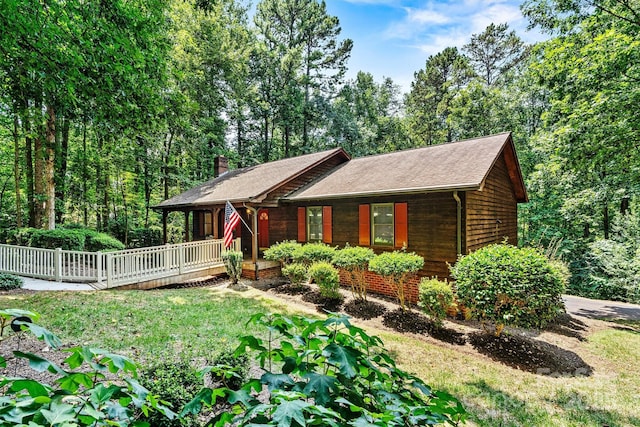 1408 Kensington Cir, Newton, NC 28658 - chalet / cabin featuring a front yard and a chimney