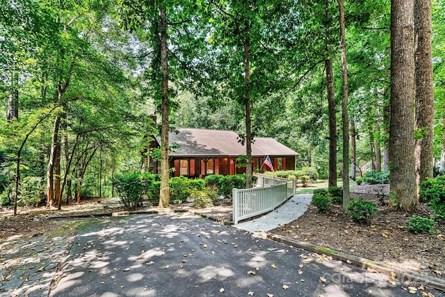 1408 Kensington Cir, Newton, NC 28658 - view of front of property featuring a porch and a forest view