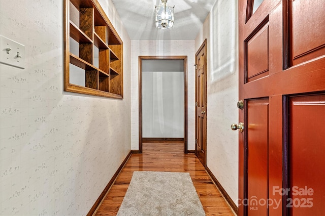 1408 Kensington Cir, Newton, NC 28658 - hallway featuring light wood-style floors and baseboards