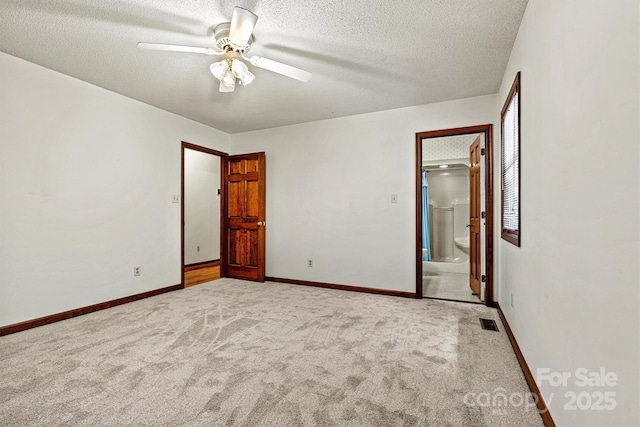 1408 Kensington Cir, Newton, NC 28658 - unfurnished room featuring a textured ceiling, carpet, and ceiling fan