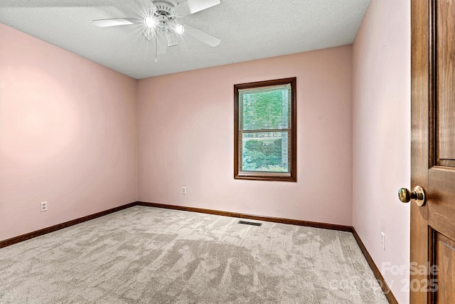 1408 Kensington Cir, Newton, NC 28658 - carpeted empty room featuring a ceiling fan and a textured ceiling