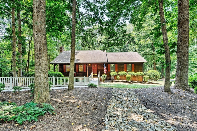 1408 Kensington Cir, Newton, NC 28658 - view of front of property with covered porch and a chimney