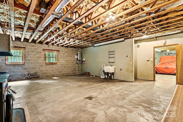 1408 Kensington Cir, Newton, NC 28658 - below grade area featuring a sink and water heater