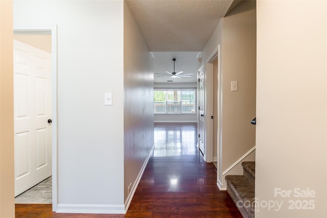 14924 Jerpoint Abby Dr, Charlotte, NC 28273 - corridor with wood finished floors, stairs, and a textured ceiling