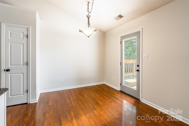 14924 Jerpoint Abby Dr, Charlotte, NC 28273 - unfurnished dining area featuring dark wood-style floors and vaulted ceiling