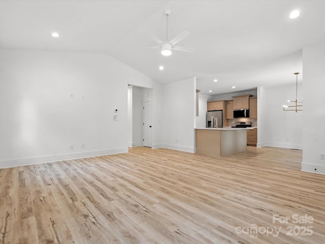 4113 Rutgers Ave, Charlotte, NC 28206 - unfurnished living room featuring lofted ceiling, light wood finished floors, ceiling fan, recessed lighting, and a chandelier