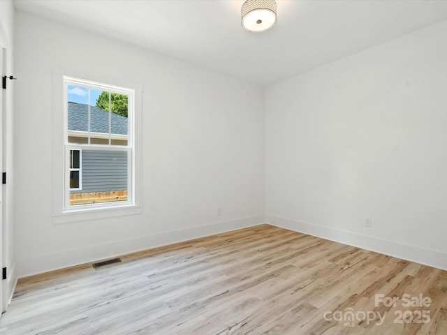 4113 Rutgers Ave, Charlotte, NC 28206 - empty room featuring light wood-type flooring and baseboards
