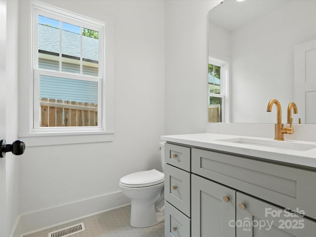 4113 Rutgers Ave, Charlotte, NC 28206 - bathroom featuring healthy amount of natural light, vanity, and tile patterned floors