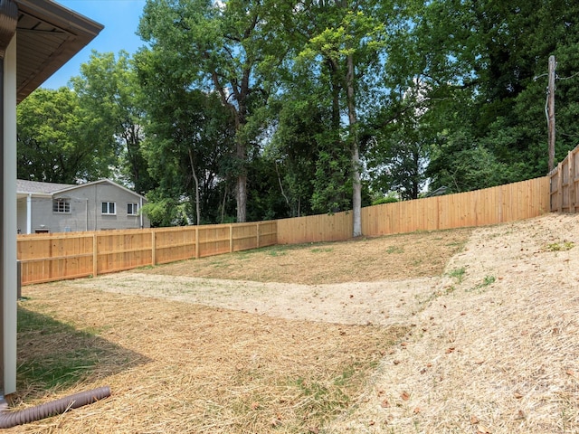4113 Rutgers Ave, Charlotte, NC 28206 - fenced backyard with view of scattered trees