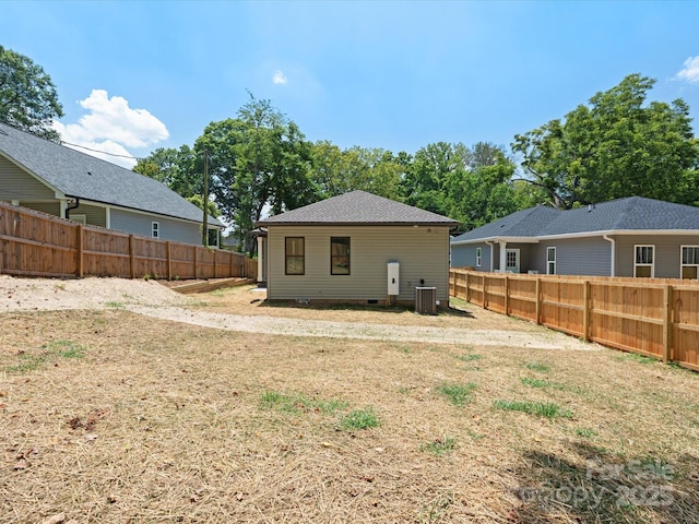 4113 Rutgers Ave, Charlotte, NC 28206 - rear view of house with a fenced backyard and crawl space