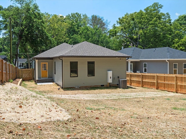 4113 Rutgers Ave, Charlotte, NC 28206 - back of property featuring a fenced backyard, a shingled roof, and crawl space