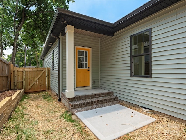 4113 Rutgers Ave, Charlotte, NC 28206 - view of exterior entry with a patio area and a gate