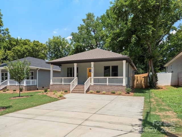 4113 Rutgers Ave, Charlotte, NC 28206 - bungalow-style home featuring a porch and a shingled roof