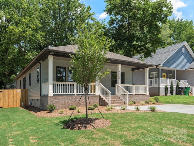 4113 Rutgers Ave, Charlotte, NC 28206 - view of front of home with a porch and roof with shingles