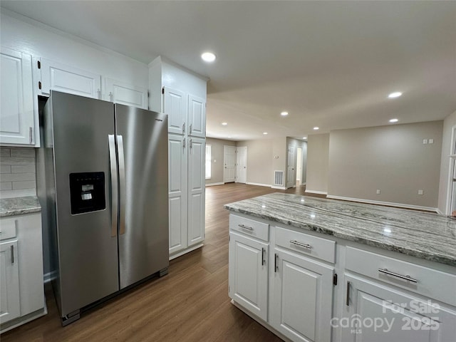 2443 1st Street Pl NW, Hickory, NC 28601 - kitchen featuring stainless steel fridge with ice dispenser, recessed lighting, white cabinets, and dark wood-style floors