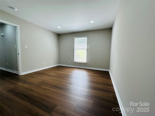 2443 1st Street Pl NW, Hickory, NC 28601 - unfurnished room featuring dark wood finished floors, recessed lighting, and a smoke detector
