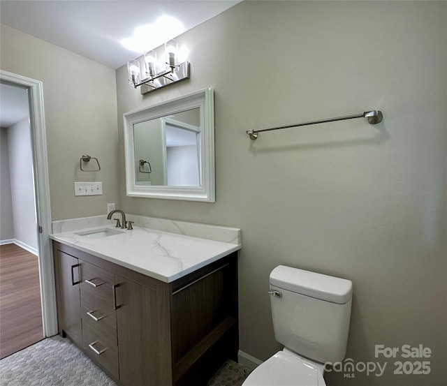2443 1st Street Pl NW, Hickory, NC 28601 - bathroom featuring vanity and a chandelier