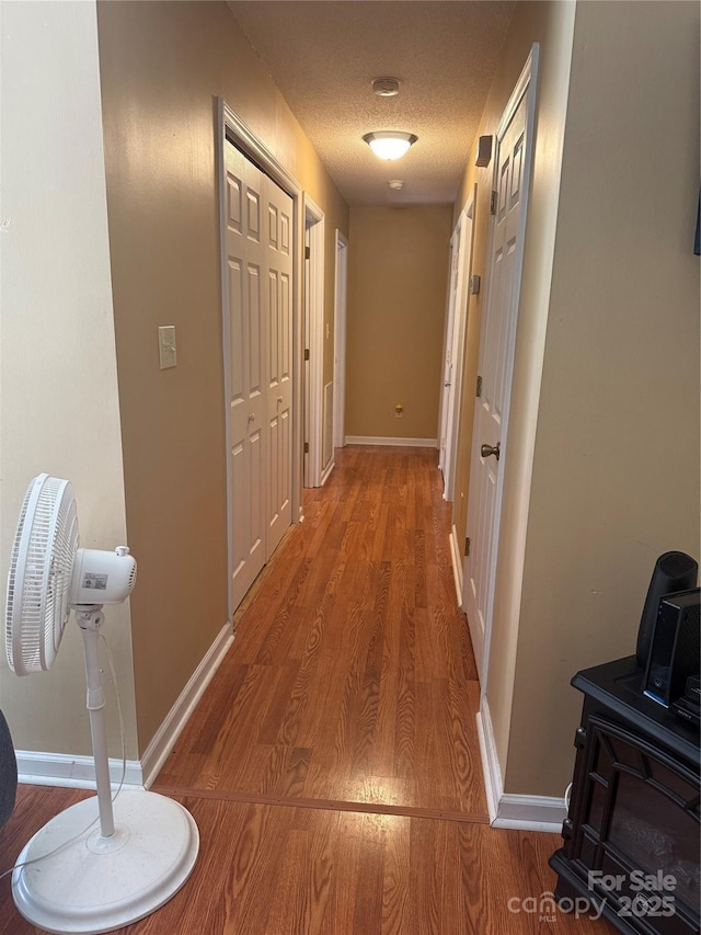 2832 Laurel Ln, Lenoir, NC 28645 - hallway with wood finished floors and baseboards