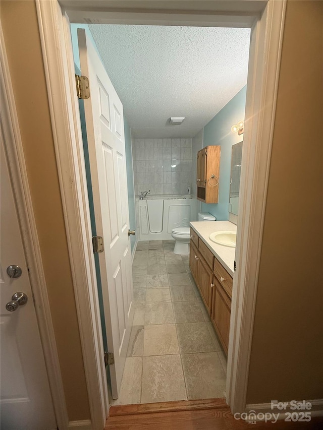 2832 Laurel Ln, Lenoir, NC 28645 - full bathroom with a bath, vanity, and a textured ceiling