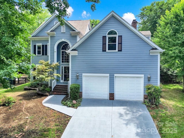 10807 Summitt Tree Ct, Charlotte, NC 28277 - traditional home featuring concrete driveway, a chimney, and an attached garage